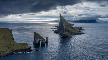 Drangarnir, Tindholmur and Mykines islands drone aereal view from Vagar, Faroe Islands 16:9の写真素材