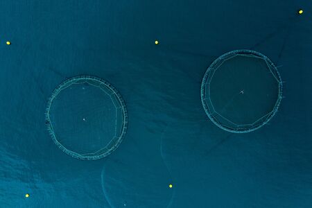 Fish farm aquaculture aerial view, Faroe Islandsの写真素材