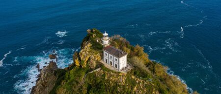 Getaria lighthouse in Gipuzkoa, Basque country - drone aerial view 21:9の写真素材