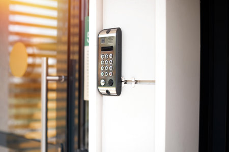 Doorphone with code near the door, entrance at the houseの写真素材