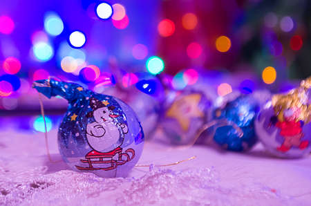 Christmas decorations on the table and beautiful bokeh ready for a happy new yearの写真素材