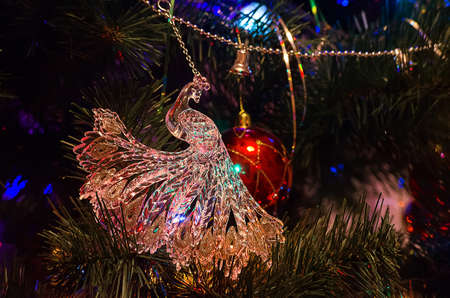 Christmas tree with toys and decorative snow for a happy new yearの写真素材