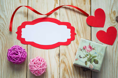 Postcard on valentine's Day with a frame and heartsの写真素材