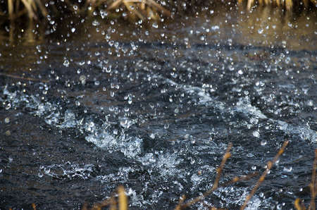 The air drops of water in motion river spring outdoorsの写真素材