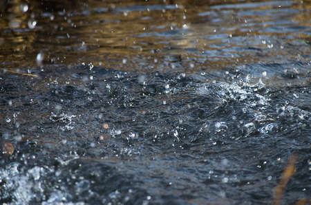 The air drops of water in motion river spring outdoorsの写真素材