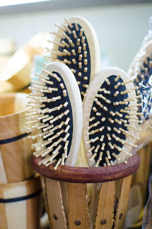 Wooden white crests slipped into a glass for saleの写真素材