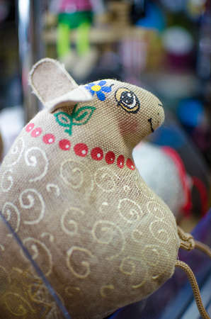 Doll made by hand on a background of nature or limited white backgroundの写真素材