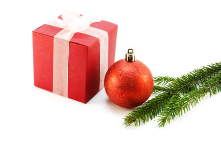 Christmas toys and Christmas tree branch on a white background limited
