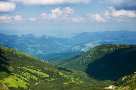 The landscape on the Carpathian Mountains in Ukraine on a summer dayの写真素材