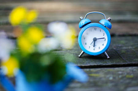 A small alarm clock gives a signal for the morning riseの写真素材
