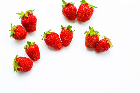 Red delicious strawberries for desserts and fresh juices in summer for ice cream on a limited backgroundの写真素材