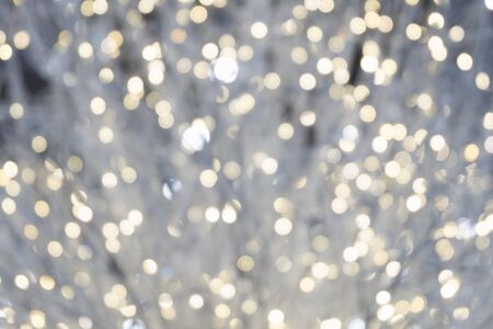 white bokeh light blurred, holiday abstract background, blur defocusedの写真素材