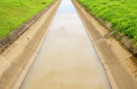                long wide water canal for watering         の写真素材