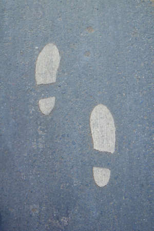            Footprints Painted On Road        の写真素材