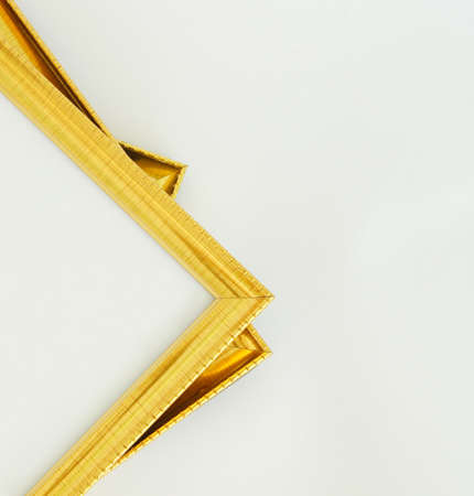 Gold and wood frame on white background                   の写真素材