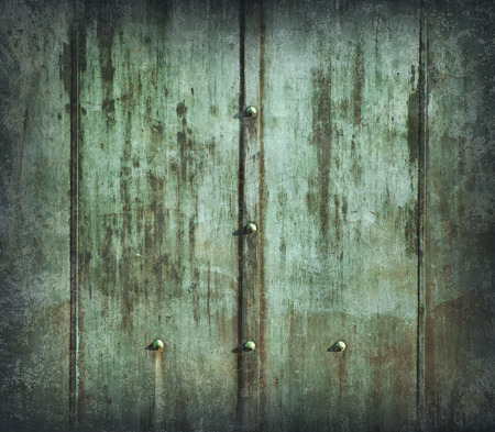 Metal green painted wall, weathered and grunge