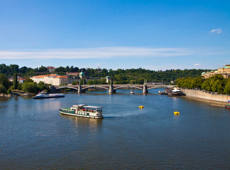 The river Moldau crosses the city of Prague, many cruise ships and boats of every dimensions offer...