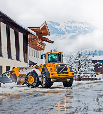Koetschach, Austria - snowplow working on the road after heavy snow storm