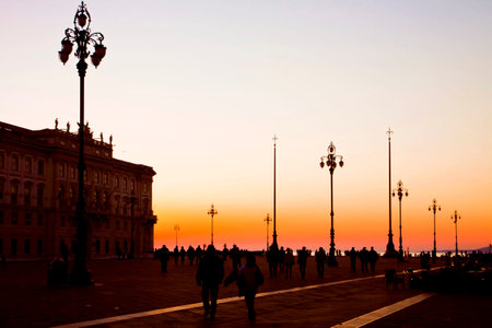 Trieste, Italy - Unity of Italy Square at sunset. Former called Great Square it is the main town square in Trieste and faces the Adriatic Sea and includes the city's municipal buildings and other important palaces.のeditorial素材