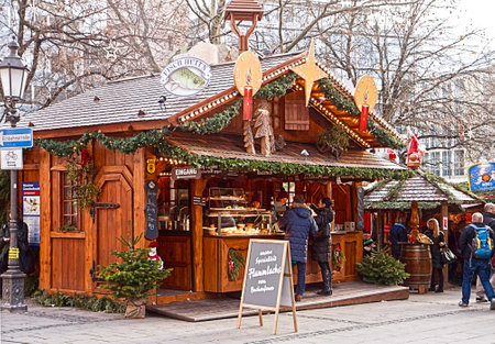 Munich, Germany - People halt at a fish fast food stall for a quick snack in one of the many Christmas markets in townのeditorial素材
