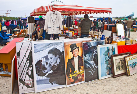 Munich, vintage movie posters and clothing on sell at the open air giant flea market,the biggest flea market of Bavaria, more than 2000 market stalls just for one day in spring. You find everything, very cheap.のeditorial素材