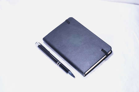 Black pan and blank notebook for your message - illustrationの写真素材