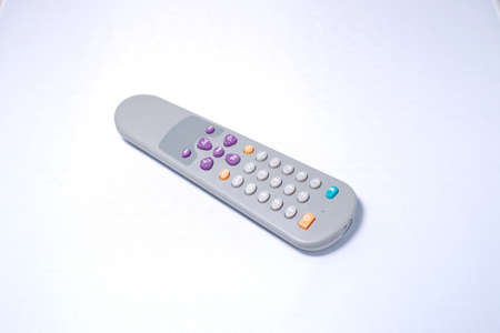Remote control changing channels while watching TV in background