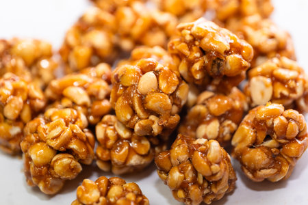 Chikki is a popular Indian sweet made from peanuts and jaggeryの写真素材