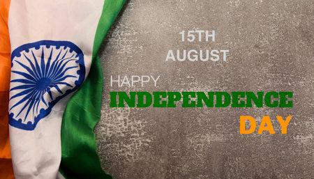 Celebrate India's freedom with this vibrant image of the Indian flag and a Happy Independence Day messageの写真素材