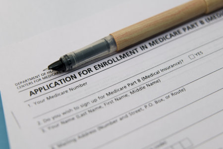 Close-up of a Medicare enrollment form with a pen, ready for senior healthcare information.