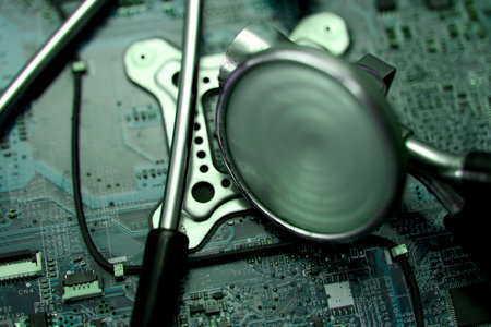 Stethoscope examining a complex motherboard, highlighting tech support and cybersecurity.の写真素材