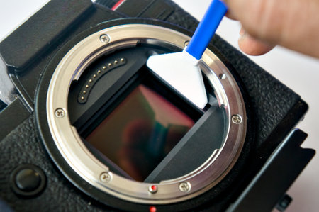 Keeping your camera's sensor spotless.  Precision cleaning for optimal image quality.の写真素材