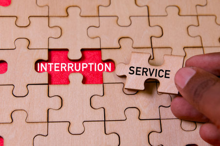 Placing the last piece in a puzzle labeled service interruption, symbolizing problem-solving...
