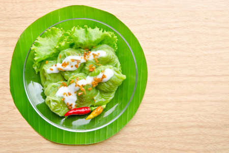 Dessert of Thailand KHOW KRIEB PAK HMOR on surface woodenの写真素材