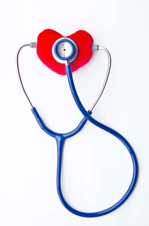 stethoscope and red heart isolated on white backgroundの写真素材