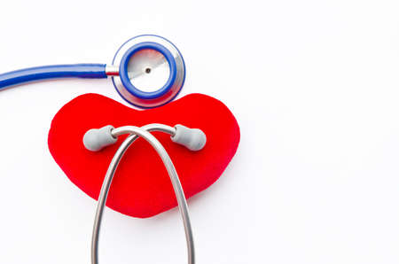 stethoscope and red heart isolated on white background