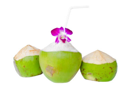 Green coconuts with drinking straw isolated on white backgroundの写真素材