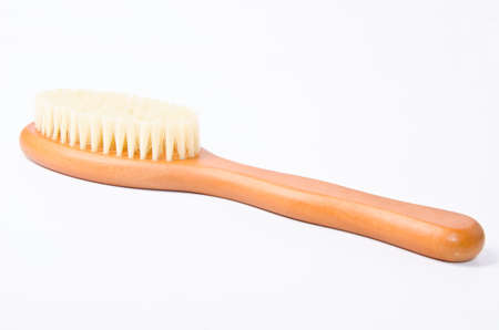 wooden soft body brush on white background