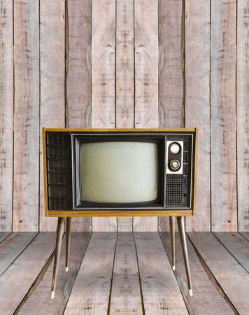 vintage television in old wooden room.の写真素材