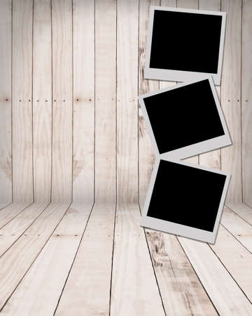 White paper picture frame on wood panelの写真素材