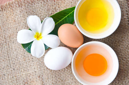 different fresh eggs and duck eggs. Isolated on white background