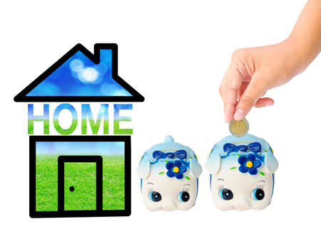 Money Saving with Piggy bank and home icon. saving money for home concept.の写真素材