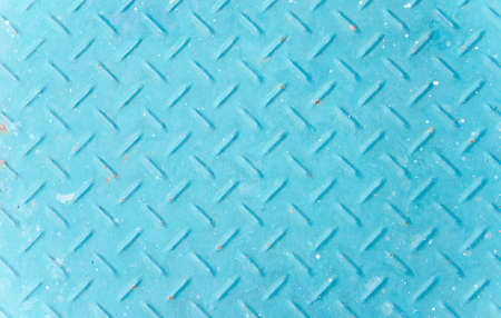 Background of old blue color metal diamond plate.の写真素材