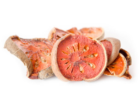 Dry Bael Fruit tea (Aegle marmelos) isolated on white backgroundの写真素材