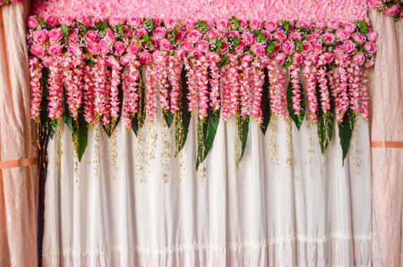 Beautiful pink rose flower wedding backdrop decorationの写真素材