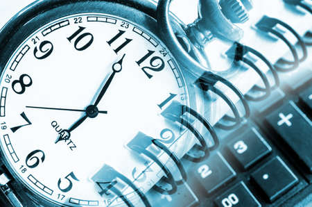 Business concept with clock, calculator and documents