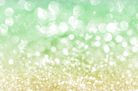Defocused gold and green abstract christmas backgroundの写真素材