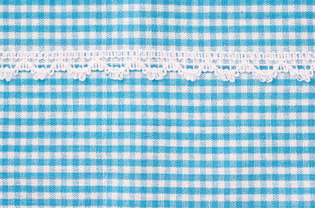Beautiful blue and white tablecloth italian style with white lace texture wallpaper or background.