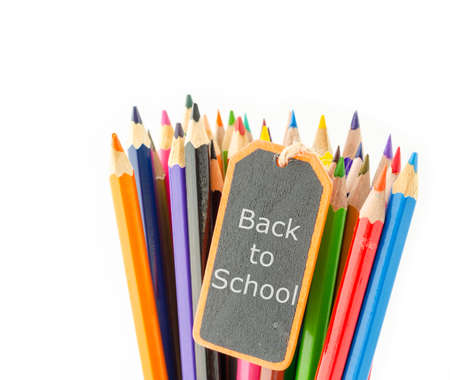 Back to school in black wooden tag and Colorful pencil crayons on a white background, Back to school