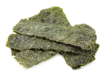 fried korean style seaweed on white backgroundの写真素材